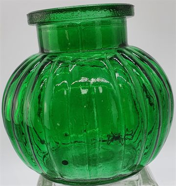 Grøn Glas. ca. 3,5 cm i diameter.